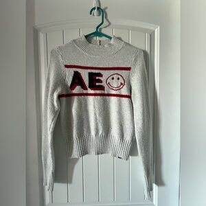 Women’s American Eagle Smiley mock neck sweater